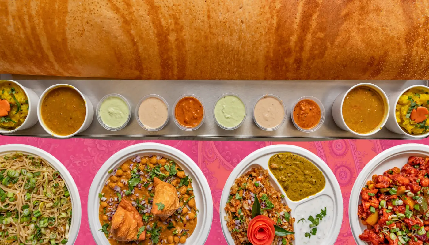 South Indian catering spread with family dosa, chutneys, curries and noodles